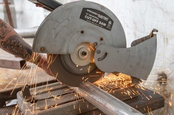 Sawing a metal pipe for custom fabrication